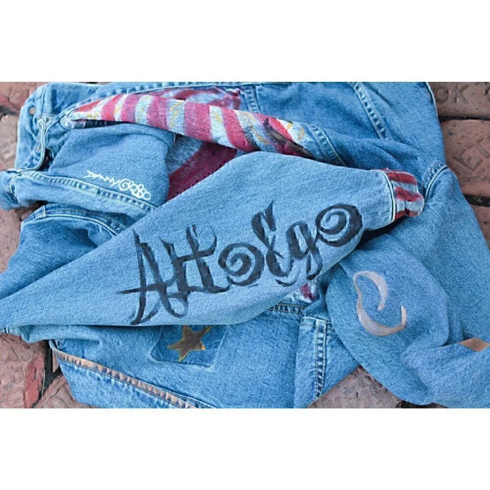 Vintage faded denim classic jean jacket. Retro cut with hand painted images
